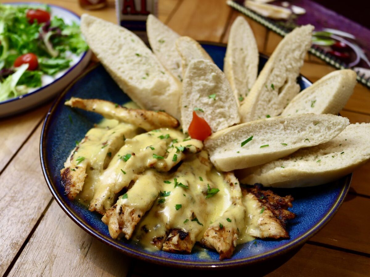 Breaded Chicken Strips with Special Sauce (Tiras de Frango Empanadas com Molho Especial) served at Boteco Restaurant